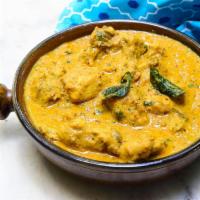 14. Chicken Malai · Cooked with coconut sauce. Served with basmati rice.