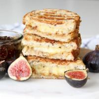 Adult Grilled Cheese · Homemade fig jam, goat cheese, cheddar cheese (side order not included)