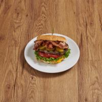 Bacon Cheeseburger · 8 oz. ground beef with American cheese and bacon.