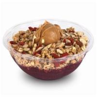 Health Nut Acai Bowl · Base:  Acaí, strawberry, blueberry, and banana. Topped with granola, peanut butter, goji be...