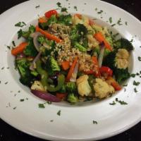 Sesame and Vegetable Stir Fry  · Vegetables tossed with teriyaki sauce over organic brown rice