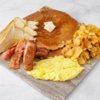Big Breakfast · 2 eggs, 2 pancakes, 2 slices of bacon and 2 sausages. Served with potatoes and toast.