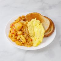2 Eggs · Served with potatoes or grits and toast.