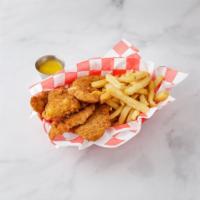 Chicken Tenders in the Basket · With french fries, coleslaw and pickle.