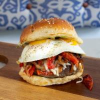 13. Pepperonatta Burger · Beef, pepperonatta (roasted peppers, sauteed onions and black olives) melted mozzarella and ...