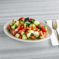Turkish Salad · Tomatoes, cucumbers, peppers, onions, and parsley.