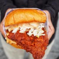 Howdy Sammie · Fried chicken breast on brioche bun with Howdy slaw, sweet pickles and Howdy sauce. Add Amer...