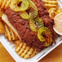 Howdy Basket · 2 chicken tenders served with waffle fries, white bread sweet pickles and Howdy sauce.