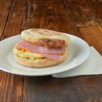 Ham & Cheddar Breakfast Sandwich · Honey-smoked ham, shredded cheddar, 1 scrambled egg all on a toasted English muffin.