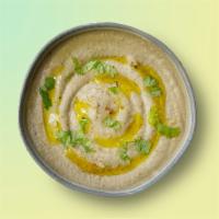 Baba Ganoush Blush · A blend of fresh roasted eggplant our signature tahini sauce diced tomatoes and onions.