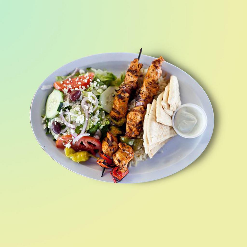 Char-grilled Chicken Kebab Dinner · Tender cuts of chicken marinated with our signature spice mix, skewered, and char-grilled.