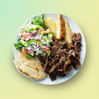 OG Gyro Dinner · Chargrilled gyro meat, wrapped to perfection with fresh veggies, comes with a side salad, pi...