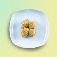 Broadway Baklava · A rich dessert pastry composed of layers of flaky dough, filled with chopped nuts and held t...