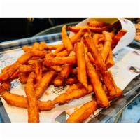 Sweet Potato Fries · Our sweet potato fries are coated in a light, savory batter making every bite a balanced des...
