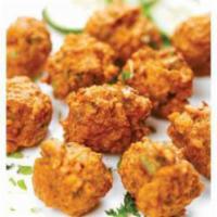 Vegetable Pakoras · Several healthy vegetables are incorporated with the mixture of gram flour and spices, fried...