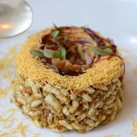 Bombay Bhel Puri · Puffed rice and bits of crunchy puri mixed in with sev and blend of chutneys.