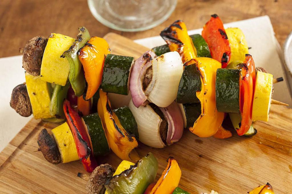 Tandoori Vegetables · Marinated vegetables are skewered and cooked in clay oven.