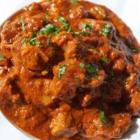Lamb Rogan Josh · Tomato flavored sauce, rich and spicy. Served with portion of Basmati rice.