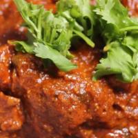 Lamb Vindaloo · Lamb cooked in hot and tangy curry sauce. Served with portion of Basmati rice.