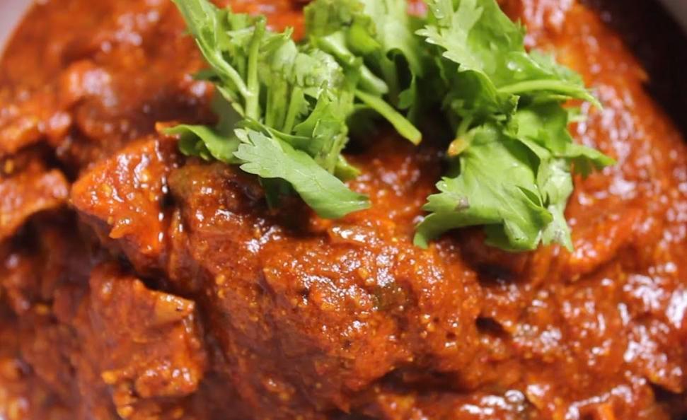 Lamb Vindaloo · Lamb cooked in hot and tangy curry sauce. Served with portion of Basmati rice.