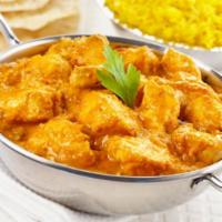 Chicken Korma · Chicken simmered in a creamy fragrant sauce with onion, garlic, ginger and cashews. Served w...