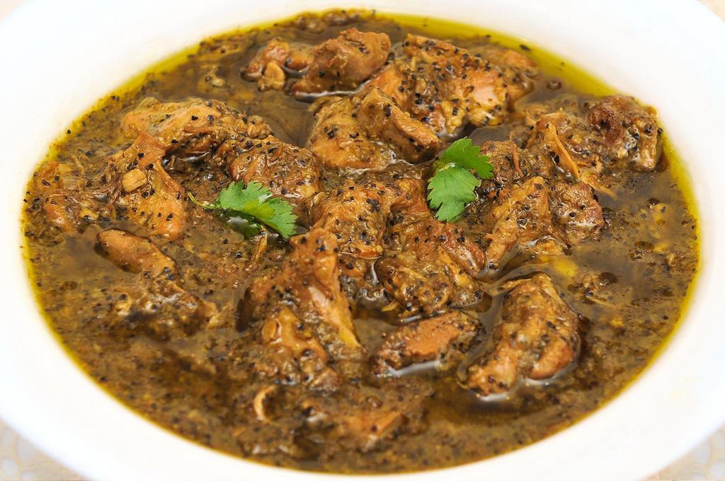 Chicken Kali Mirch · Tender chicken cooked in fresh ground black peppercorn, ginger and garlic in a fairly hot sauce. Served with portion of Basmati rice.