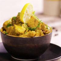 Lemon Chicken Curry · Traditional chicken curry with fenugreek and lemon. Served with portion of rice.
