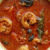 Kerala Shrimp Curry · Simmered in a light and spicy stew of coconut and onions, flavored with curry leaves and bla...