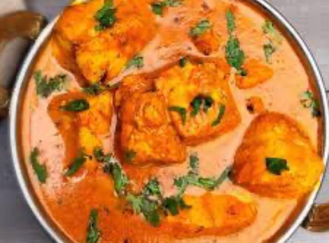 Goan Fish Curry · Fish cooked in a coconut, kokum and cream sauce. Served with portion of Basmati rice.