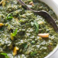 Saag · A fresh baby spinach puree, enriched and flavored with a home-made spice mix. Served with po...