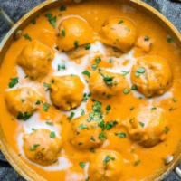 Malai Kofta · Mix vegetables and cottage cheese dumplings with cashew nuts in tomato gravy. Served with po...