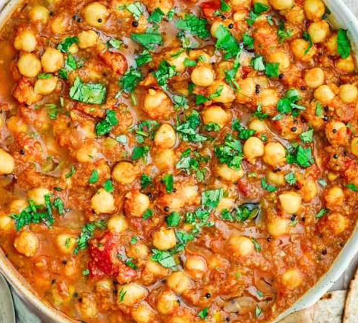 Channa Masala · With chickpeas, a high protein classic recipe with heady flavors. Served with portion of rice. (Vegan)