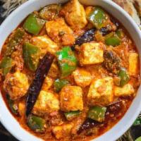 Kadai Paneer · Indian cottage cheese in a thick curry sauce with freshly pounded spices. Served with portio...