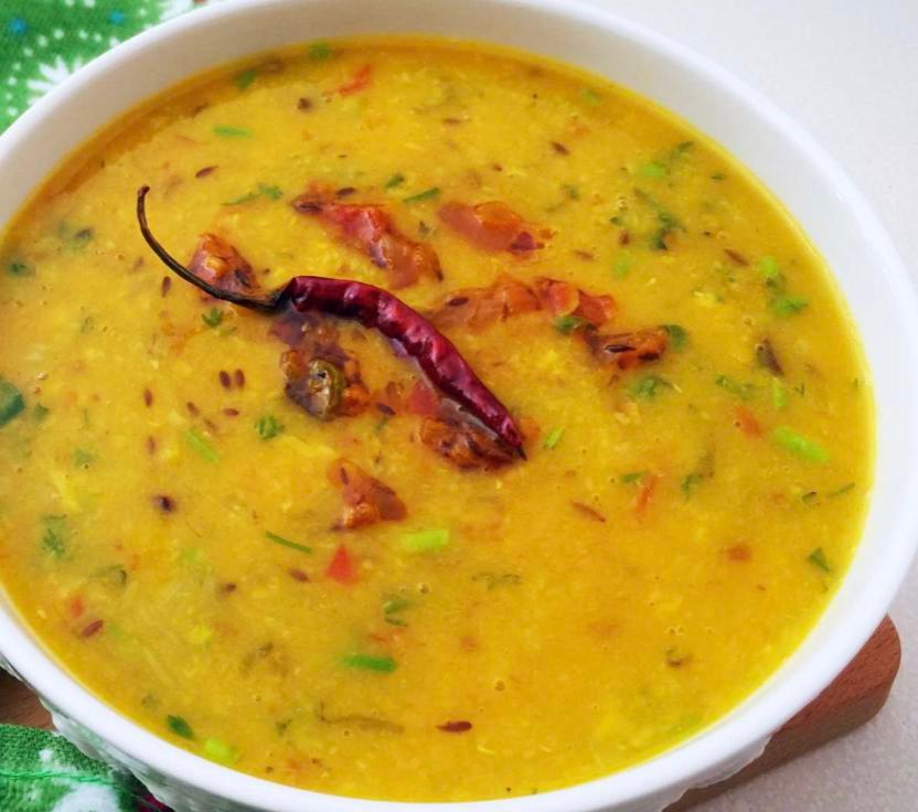 Dal Balti · Yellow lentil dish with garlic, cumin seed, whole red chilies and cilantro.