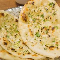 Garlic Naan · Drizzled with freshly minced garlic.