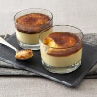 CREME BRULEE · Creamy custard topped with caramelized sugar