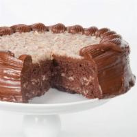 German Chocolate Cake · We complete this perfect ensemble of three light chocolate layers separated by a sensational...