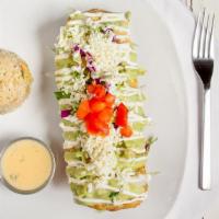 Chimi and Changa · Flour tortilla filled with shredded chicken, cheese, and crisped to perfection. Dressed in l...