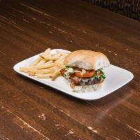 Tejano Plain Burger · Ground sirloin glazed with Aguirre's famoso. Cooked to perfection ground sirloin on a delici...