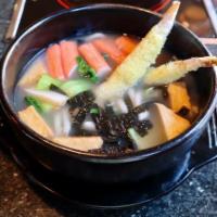 N4. Udon（乌冬面）  · Choice of shrimp tempura, chicken or beef with fish tofu, crab meat, seaweed and Shanghai bo...