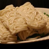 Udon Noodles 乌冬面 · Thick wheat flour noodles.