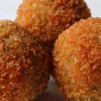 Boudin Bites · A classic boudin mixture (rice and sausage) formed, breaded, and fried to a golden brown and...