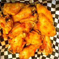 Sweet Chili Wings · Coated with a sweet, tangy, mildly spicy sauce.