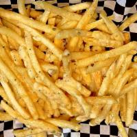 Garlic Parm Fries · Shoestring fries tossed in our version of Garlic Parmesan sauce.