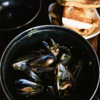 Diablo Mussels  · PEI Mussels, Ommegang Witte, Garlic, Chili Paste, Bacon, Cilantro, 
