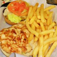 Grilled Chicken Sandwich · Grilled chicken sandwich comes with mayo lettuce onion tomato and pickle.