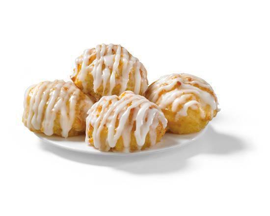 Four Frosted Honey-Butter Biscuits · Church’s signature Honey-Butter Biscuit™ topped with the same sweet icing we serve on our apple pie. Could our Honey-Butter Biscuits BE any more irresistible?! Well, actually…YES!