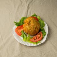 Mofongo con Cualquier Carne Frituras Dominicana · Mashed green plantain with any meat.