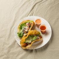 Tacos (3) · Corn tortillas, served with homemade tomatillo avocado sauce.