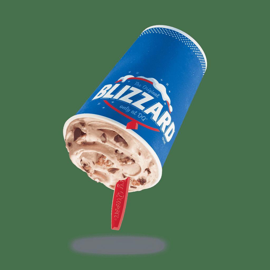 Snickers® Blizzard® Treat · Snickers® pieces and chocolatey topping blended with cream DQ® vanilla soft serve blended to Blizzard® perfection.